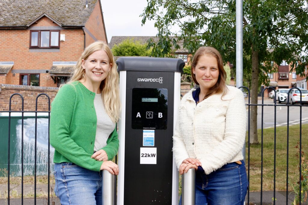 Cllr Lewing and Cllr Cooper at an elctric vehicle charger